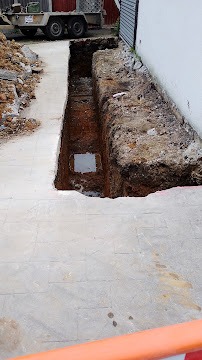 Foundation trench excavation alongside a residential property in Brentwood